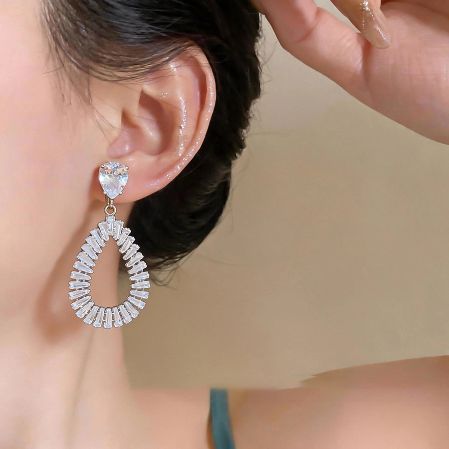 The Liquid Contour: Openwork Teardrop Zirconia Studs, side view