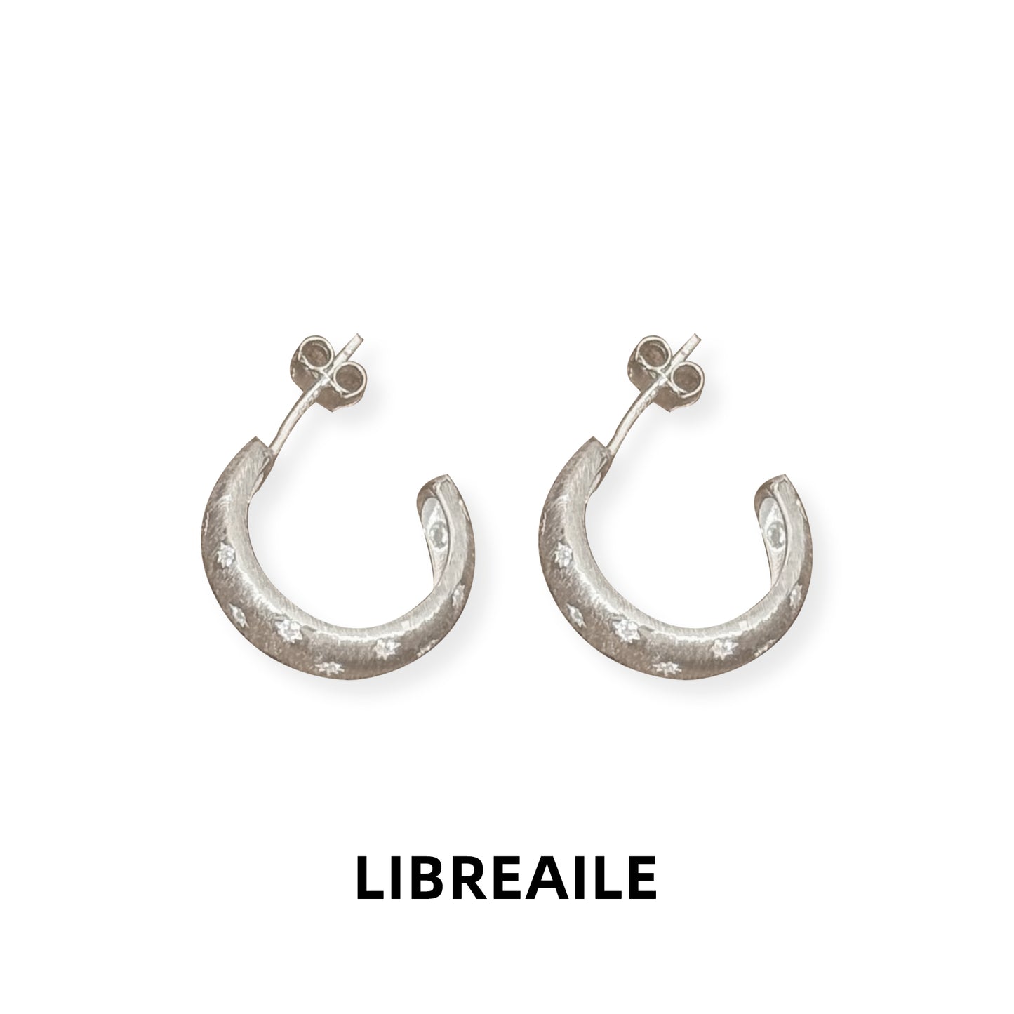 C-shape stud earrings worn on model, minimalist style