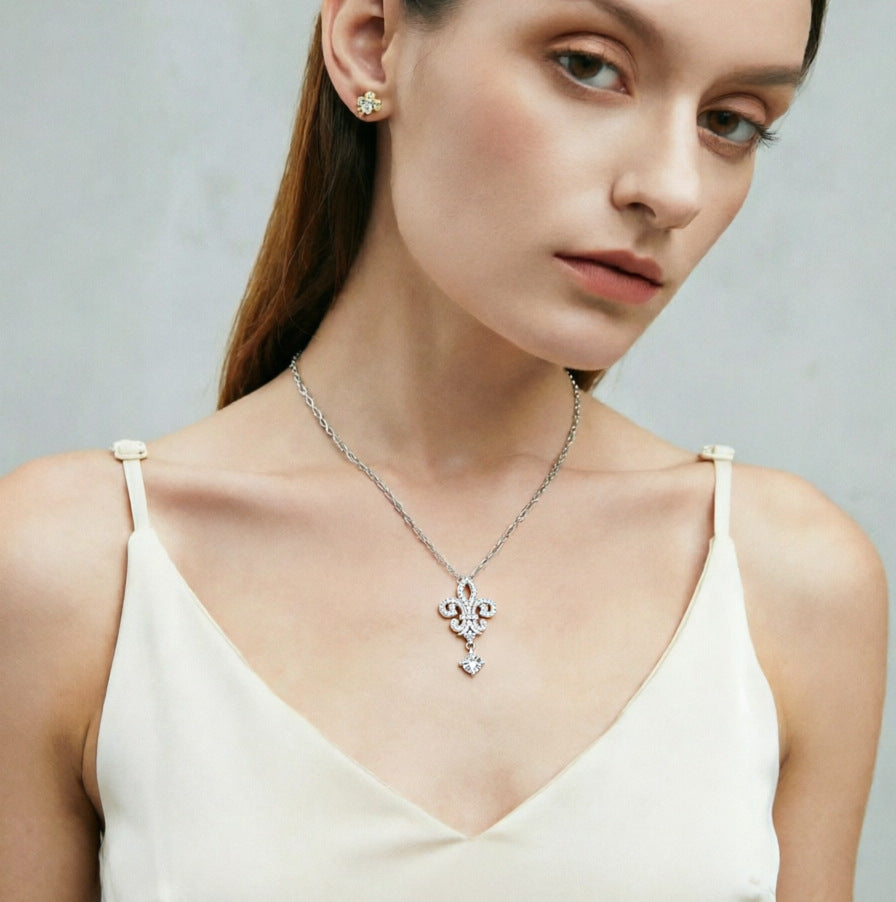 The Royal Descent: S925 Silver Crown Tassel Zirconia Necklace