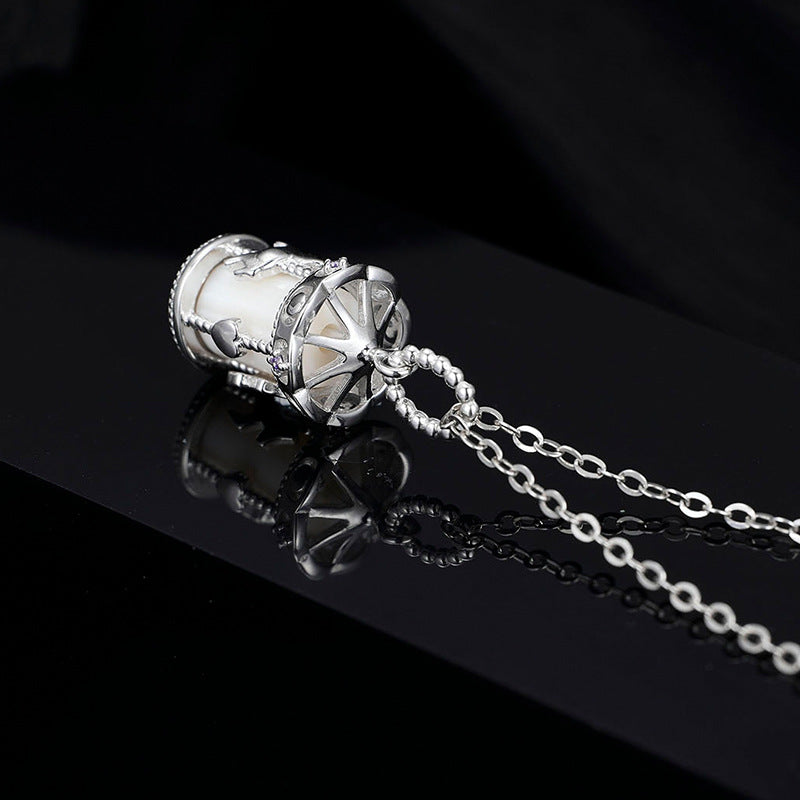 925 silver carousel pendant close-up, delicate summer necklace