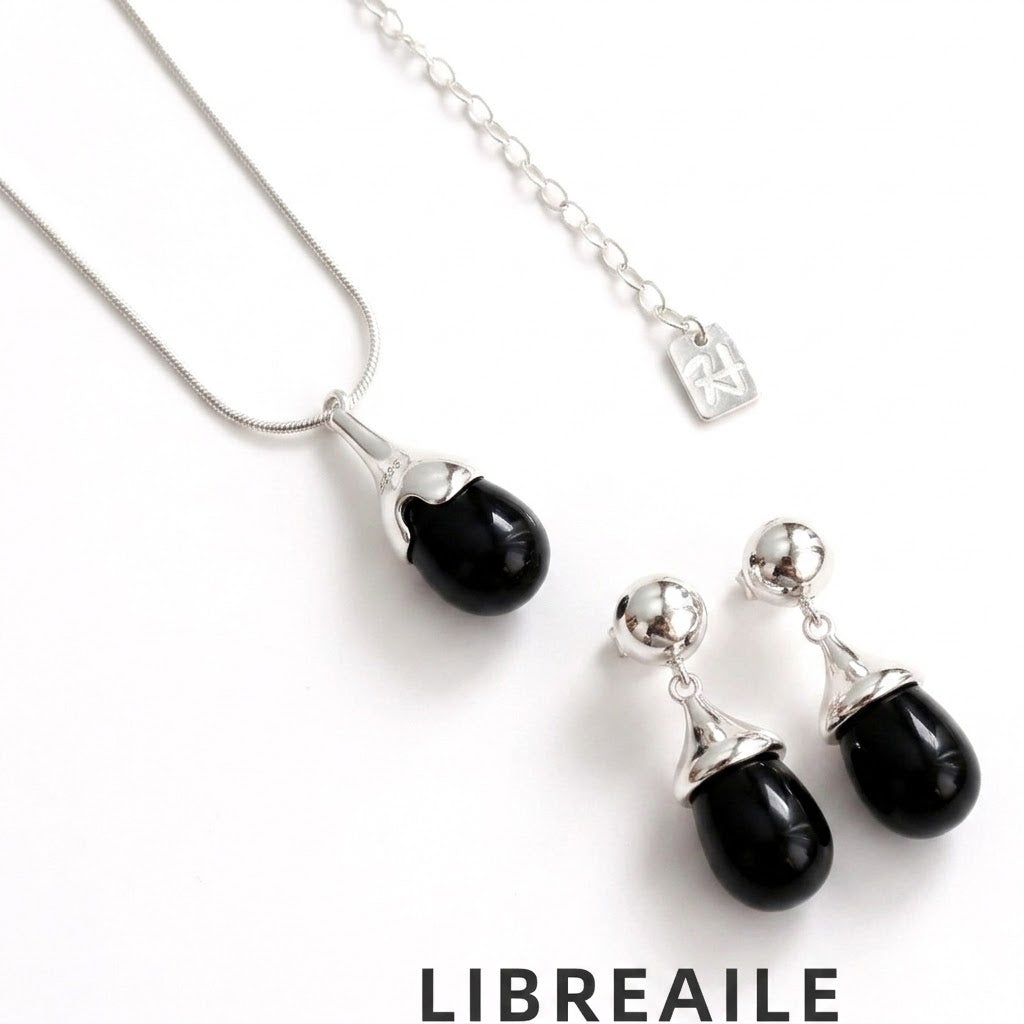Silver black gemstone set close-up, hypoallergenic jewelry